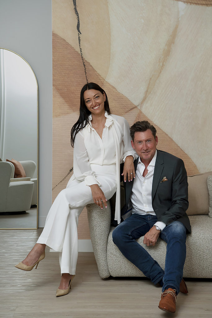 Tania and Danny (owners of BODHI) sit on chair in Cottesloe spa